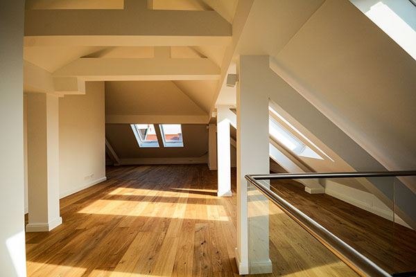 Loft conversion - Weybridge.<br>Customer review: "The team worked to our tight schedule and within budget"